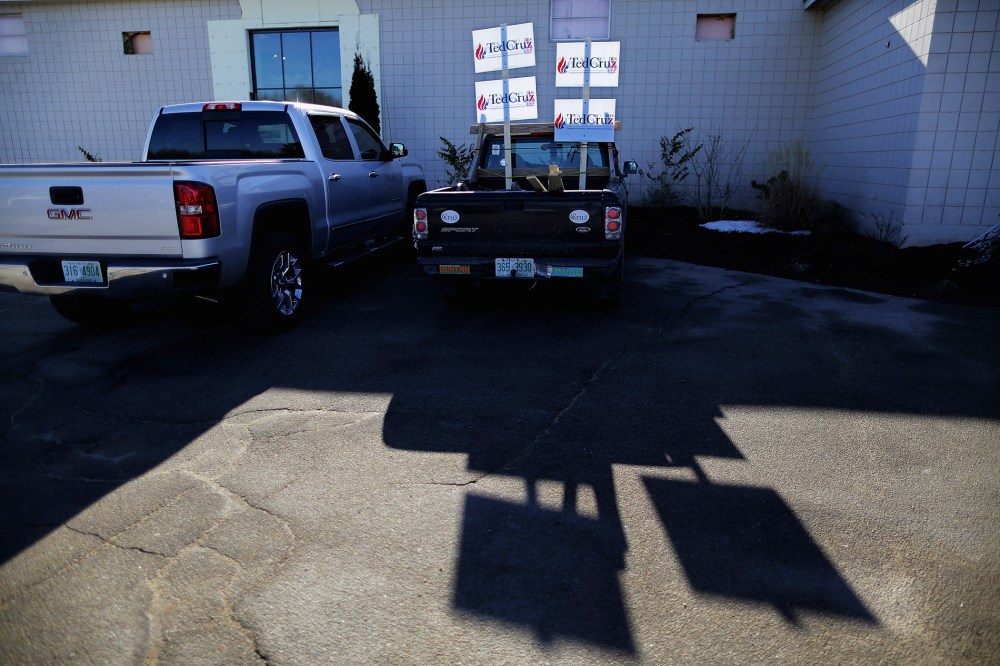 Campaign signs stand in the bed of a pickup truck outside the Crossing Life Church where Sen. Ted Cruz (R-TX) held a campaign town hall meeting Feb. 2, 2016 in Windham, N.H. (Photo by Chip Somodevilla/Getty)