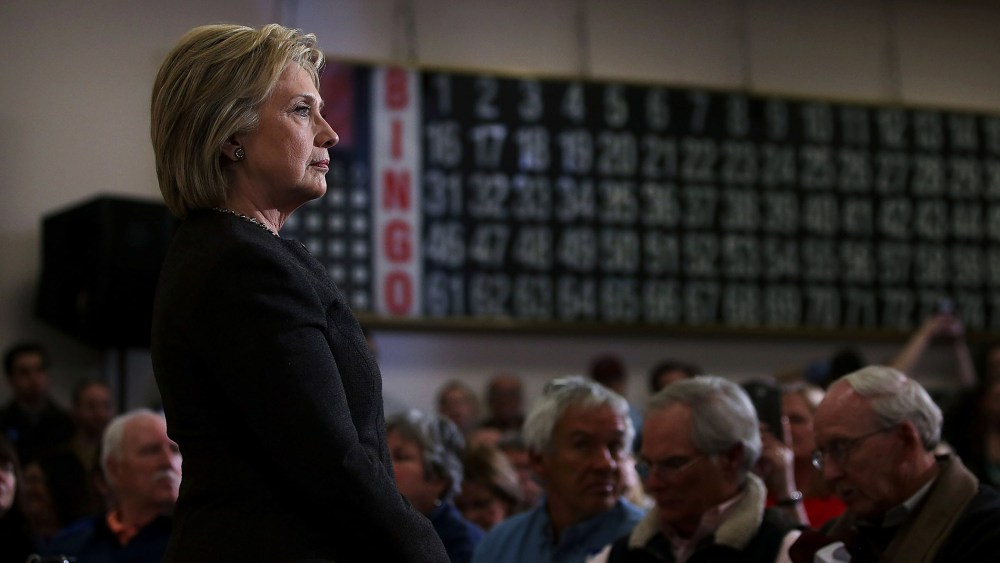 Democratic presidential candidate former Secretary of State Hillary Clinton looks on during a "get out the vote" event at Derry Boys and Girls Club on Feb. 3, 2016 in Derry, N.H. (Photo by Justin Sullivan/Getty)