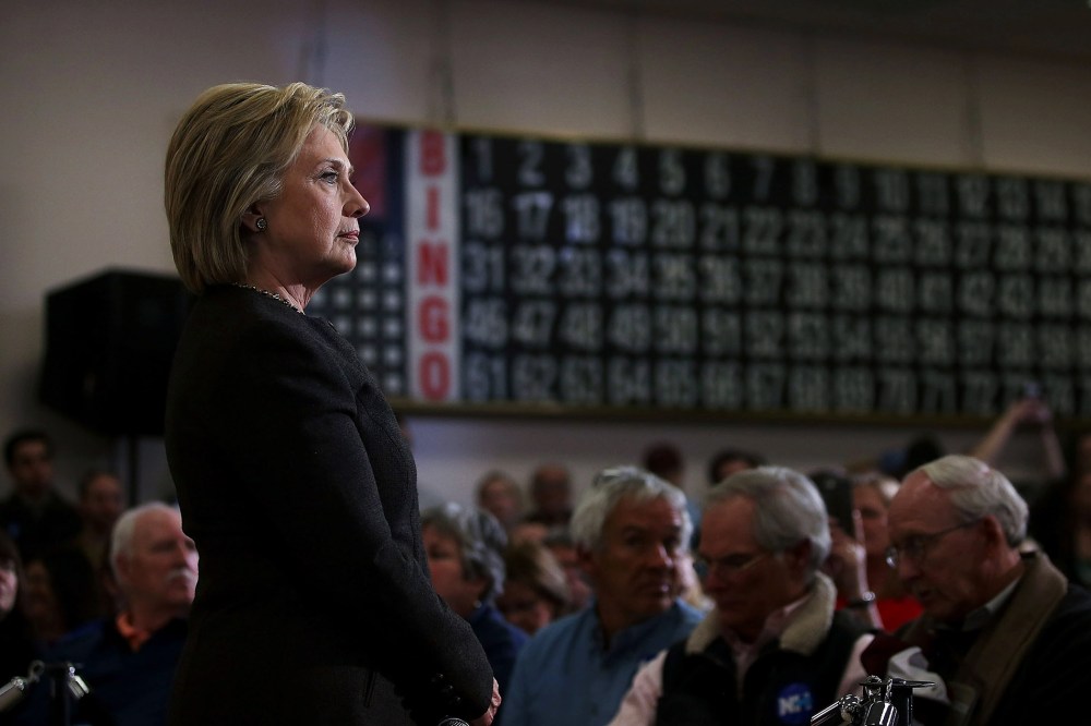 Democratic presidential candidate former Secretary of State Hillary Clinton looks on during a "get out the vote" event at Derry Boys and Girls Club on Feb. 3, 2016 in Derry, N.H. (Photo by Justin Sullivan/Getty)
