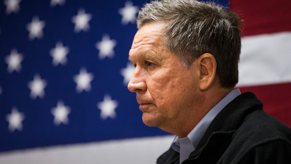 Republican presidential candidate Ohio Governor John Kasich speaks at a town hall meeting on Feb. 3, 2016 in Raymond, N.H. (Photo by Andrew Burton/Getty)