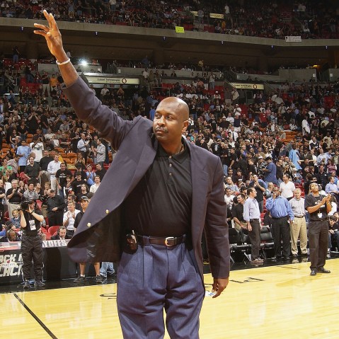 NBA Legend Moses Malone salutes the crowd during the NBA Legends tour's stop in Game four of the Eastern Conference Semifinals during the 2004 NBA Playoffs at the American Airlines Arena, on May 12, 2004 in Miami. (Photo by Issac Baldizon/NBAE/Getty)
