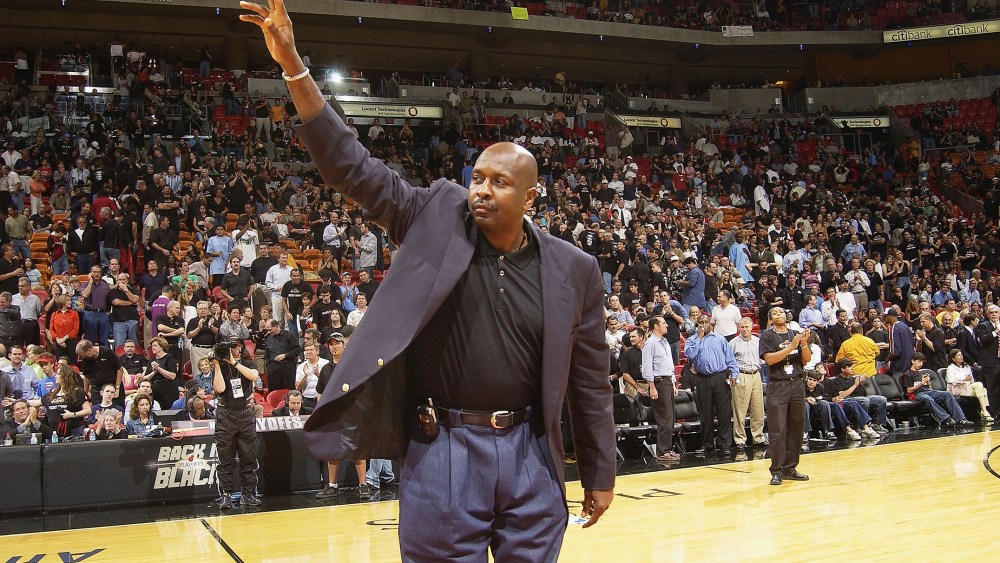 NBA Legend Moses Malone salutes the crowd during the NBA Legends tour's stop in Game four of the Eastern Conference Semifinals during the 2004 NBA Playoffs at the American Airlines Arena, on May 12, 2004 in Miami. (Photo by Issac Baldizon/NBAE/Getty)