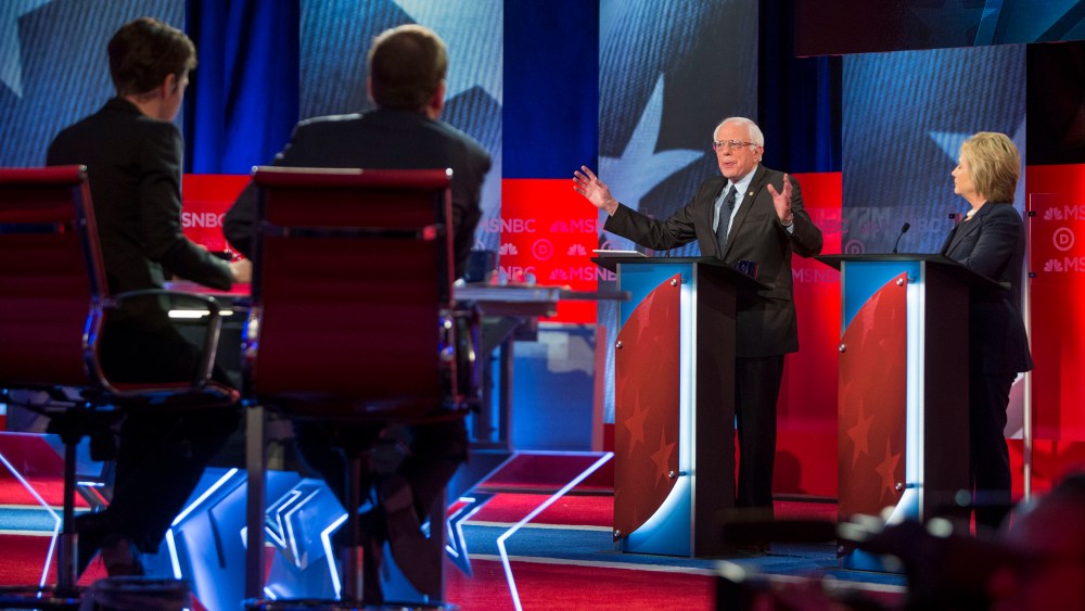 Hillary Clinton and Bernie Sanders appear during the "MSNBC Democratic Candidates Debate" on Feb. 4, 2016 at the University of New Hampshire. (Photo by Scott Eisen/MSNBC/NBCU Photo Bank/Getty)