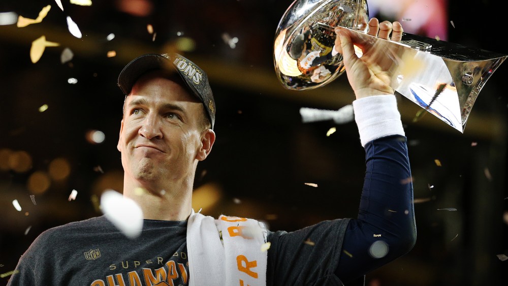 Peyton Manning #18 of the Denver Broncos celebrates with the Vince Lombardi Trophy after Super Bowl 50 at Levi's Stadium on Feb. 7, 2016 in Santa Clara, Calif. (Photo by Patrick Smith/Getty)