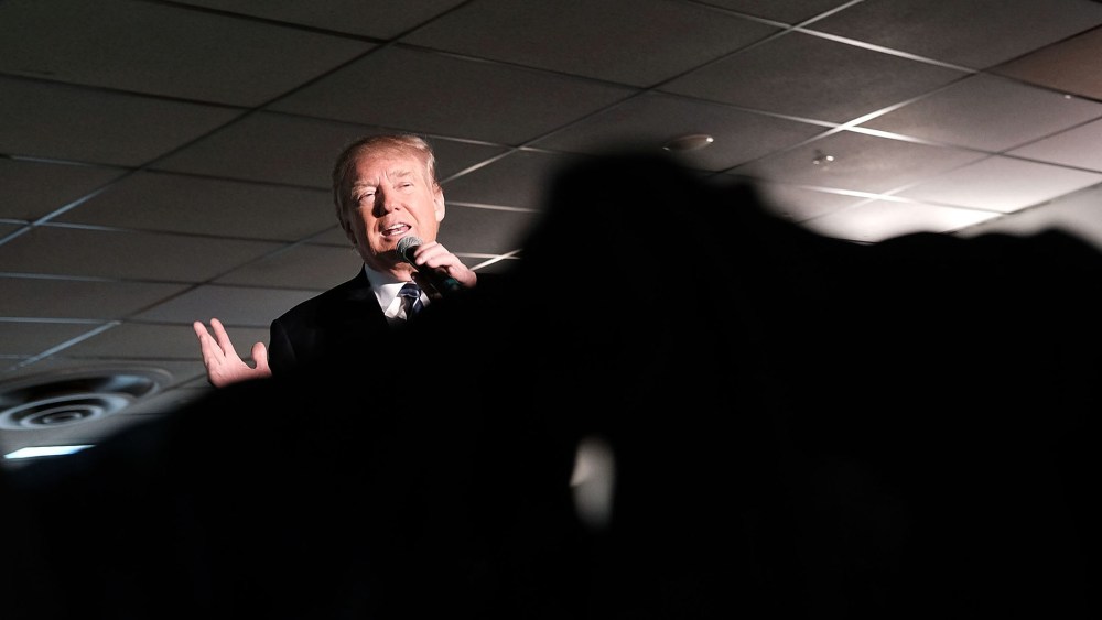 Republican presidential candidate Donald Trump speaks to a small crowd a day before voters go to the polls on Feb. 8, 2016 in Salem, N.H. (Photo by Spencer Platt/Getty)