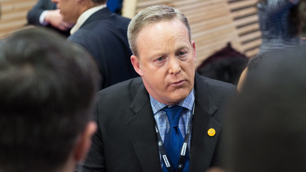 Sean Spicer speaks to reporters in the spin room after the New Hampshire Republican presidential primary debate at Saint Anselm College in Manchester, N.H. on Feb. 6, 2016. (Photo by Meredith Dake-O'Connor/CQ Roll Call/Getty)