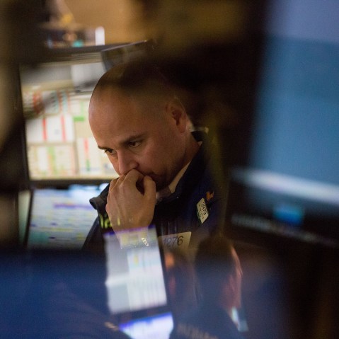 A trader works on the floor of the New York Stock Exchange (NYSE) in New York, Feb. 8, 2016. (Photo by Michael Nagle/Bloomberg/Getty)