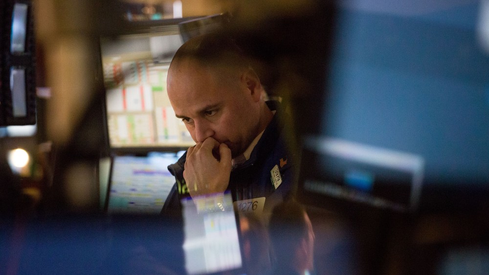 A trader works on the floor of the New York Stock Exchange (NYSE) in New York, Feb. 8, 2016. (Photo by Michael Nagle/Bloomberg/Getty)