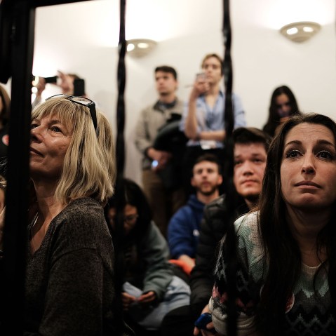 Voters watch Republican presidential candidate Ted Cruz speak at an American Legion on Feb. 8, 2016 in Manchester, N.H. (Photo by Spencer Platt/Getty)