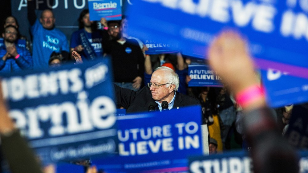 Democratic presidential hopeful Sen. Bernie Sanders waves after speaking at a campaign rally on Feb. 8, 2016 in Durham, N.H. (Photo by Andrew Burton/Getty)