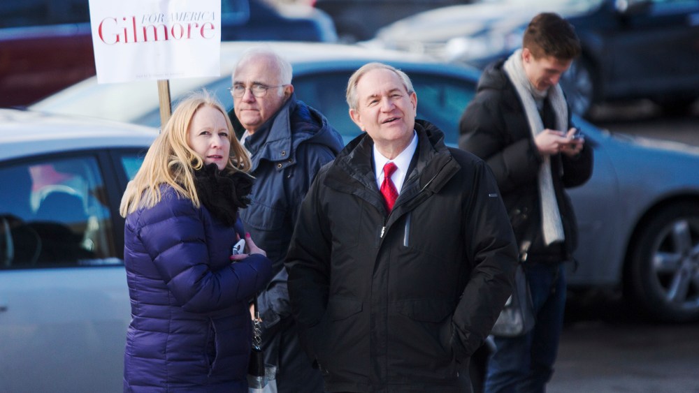 Republican presidential candidate Jim Gilmore greets voters outside the polling place at Webster School on primary day Feb. 9, 2016 in Manchester, N.H. (Photo by Scott Eisen/Getty)