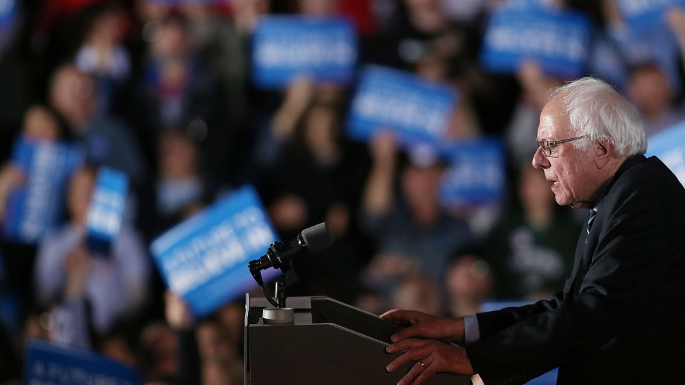 Sen. Bernie Sanders (D-VT) speaks on stage after declaring victory over Hillary Clinton in the New Hampshire Primary on Feb. 9, 2016 in Concord, N.H. (Photo by Spencer Platt/Getty)