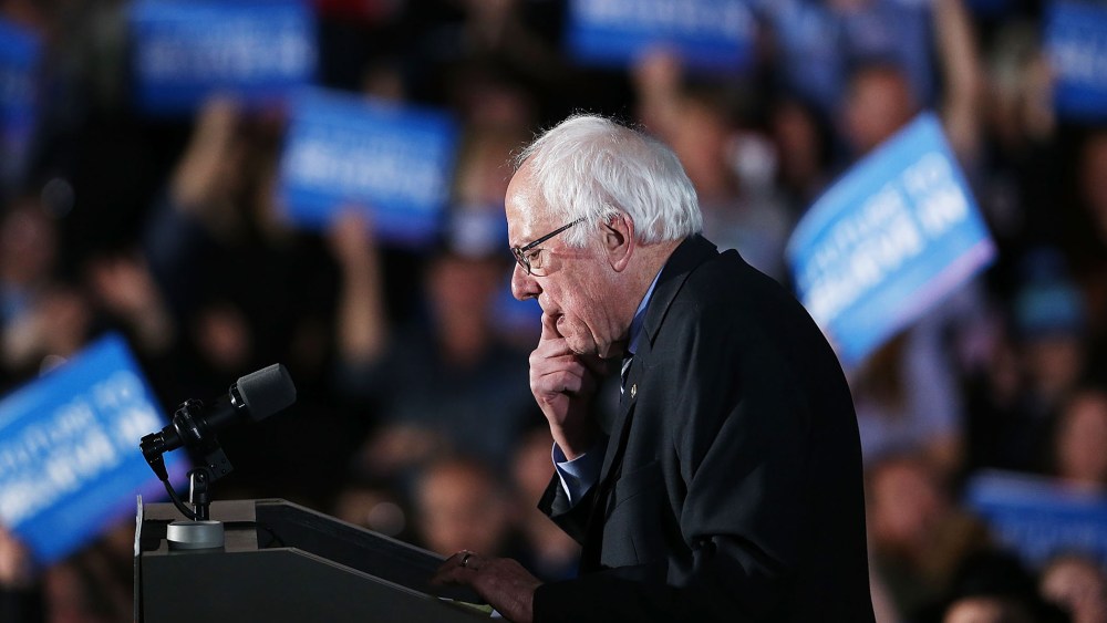 Sen. Bernie Sanders (D-VT) speaks on stage after declaring victory over Hillary Clinton in the New Hampshire Primary on Feb. 9, 2016 in Concord, N.H. (Photo by Spencer Platt/Getty)