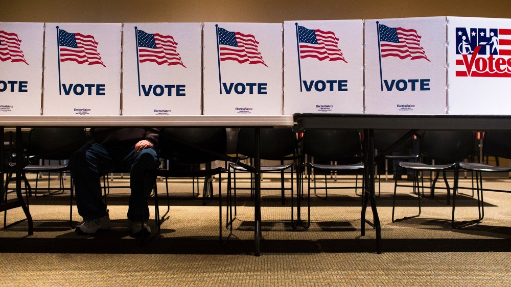 A voter casts their ballot at a polling place in Nashua, N.H., on Feb. 9, 2016. (Photo by Cassi Alexandra/For The Washington Post/Getty)
