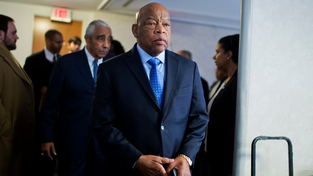 Rep. John Lewis and Rep. Charlie Rangel arrive for a news conference at the DNC where members of the Congressional Black Caucus PAC endorsed Hillary Clinton for president, Feb. 11, 2016. (Photo By Tom Williams/CQ Roll Call/Getty)