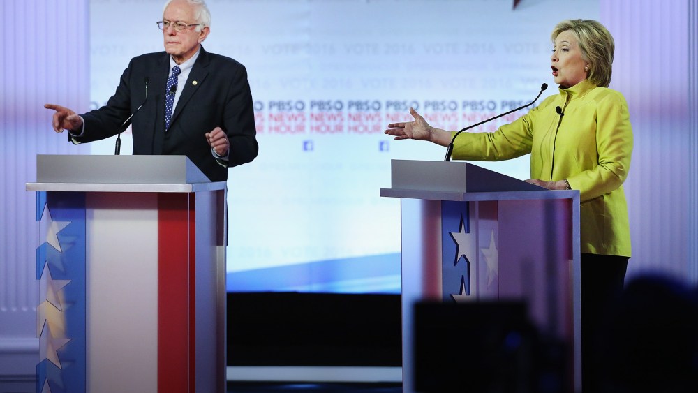 Democratic presidential candidates Senator Bernie Sanders and Hillary Clinton argue during the PBS NewsHour debate on Feb. 11, 2016 in Milwaukee, Wis. (Photo by Win McNamee/Getty)