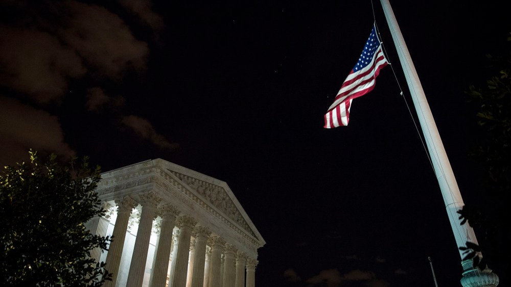The American flag flies at half mast at the U.S. Supreme Court, Feb. 13, 2016 in Washington, DC. Supreme Court Justice Antonin Scalia was at a Texas Ranch Saturday morning when he died at the age of 79. (Photo by Drew Angerer/Getty)