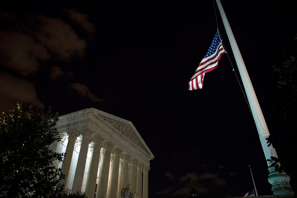 The American flag flies at half mast at the U.S. Supreme Court, Feb. 13, 2016 in Washington, DC. Supreme Court Justice Antonin Scalia was at a Texas Ranch Saturday morning when he died at the age of 79. (Photo by Drew Angerer/Getty)