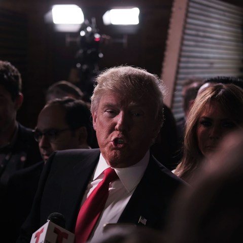 Presidential candidate Donald Trump speaks in the "Spin Room" following the Republican Presidential debate, Feb. 13, 2016 in Greenville, S.C. (Photo by Spencer Platt/Getty)