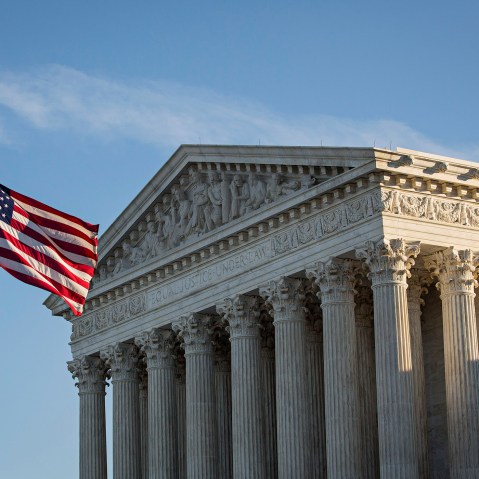 An American flag flies at half mast following the death of Supreme Court Justice Antonin Scalia at the U.S. Supreme Court, Feb. 14, 2016 in Washington, DC. (Photo by Drew Angerer/Getty)