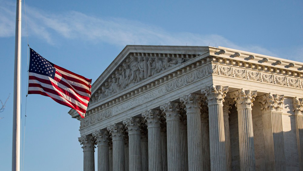 An American flag flies at half mast following the death of Supreme Court Justice Antonin Scalia at the U.S. Supreme Court, Feb. 14, 2016 in Washington, DC. (Photo by Drew Angerer/Getty)