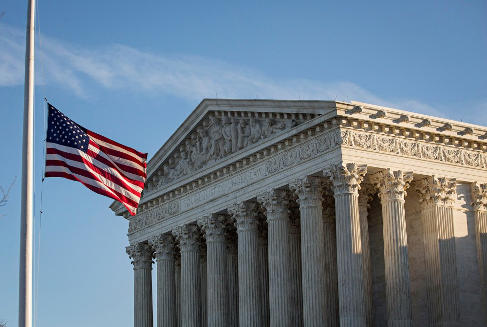 An American flag flies at half mast following the death of Supreme Court Justice Antonin Scalia at the U.S. Supreme Court, Feb. 14, 2016 in Washington, DC. (Photo by Drew Angerer/Getty)