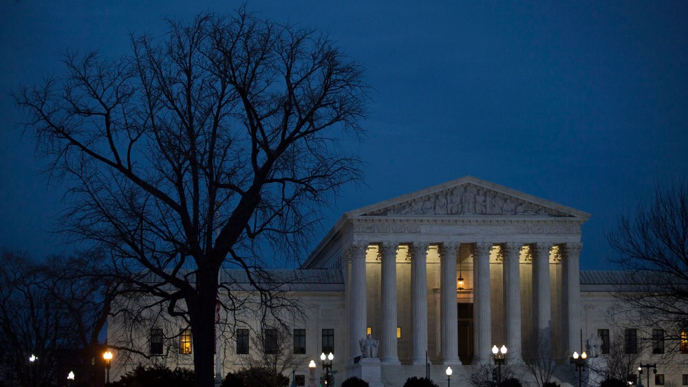 The U.S. Supreme Court is seen in at dusk on February 14, 2016 in Washington, DC. (Photo by Drew Angerer/Getty)