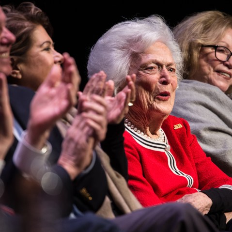 Former first lady Mrs. Barbara Bush listens to her son, Republican presidential candidate Jeb Bush, at a campaign event Feb. 19, 2016 in Greenville, S.C. (Photo by Sean Rayford/Getty)