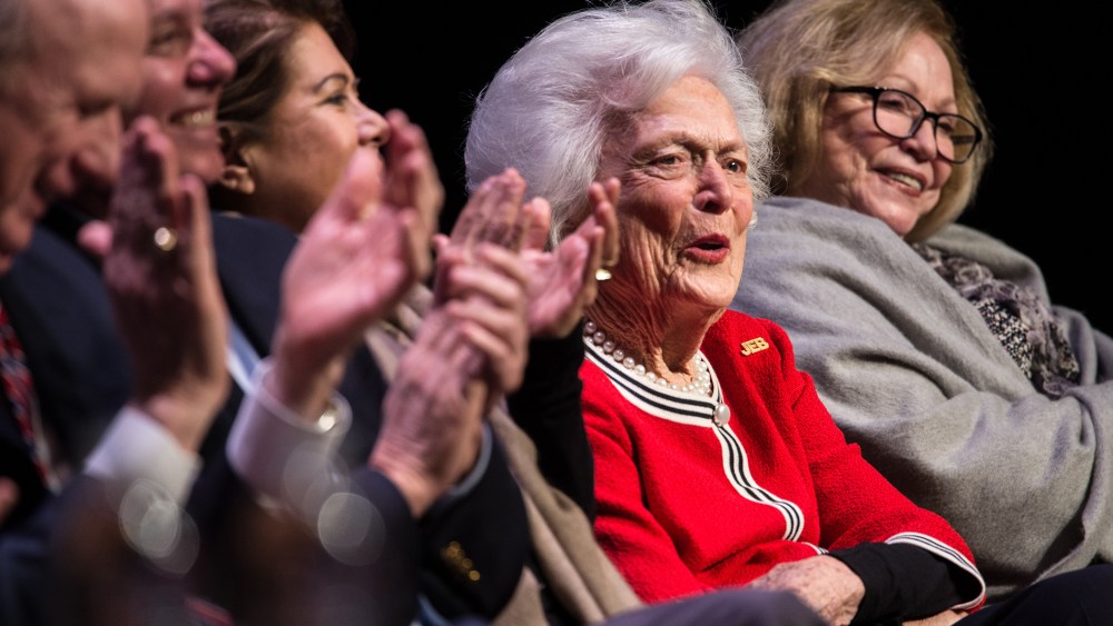 Former first lady Mrs. Barbara Bush listens to her son, Republican presidential candidate Jeb Bush, at a campaign event Feb. 19, 2016 in Greenville, S.C. (Photo by Sean Rayford/Getty)