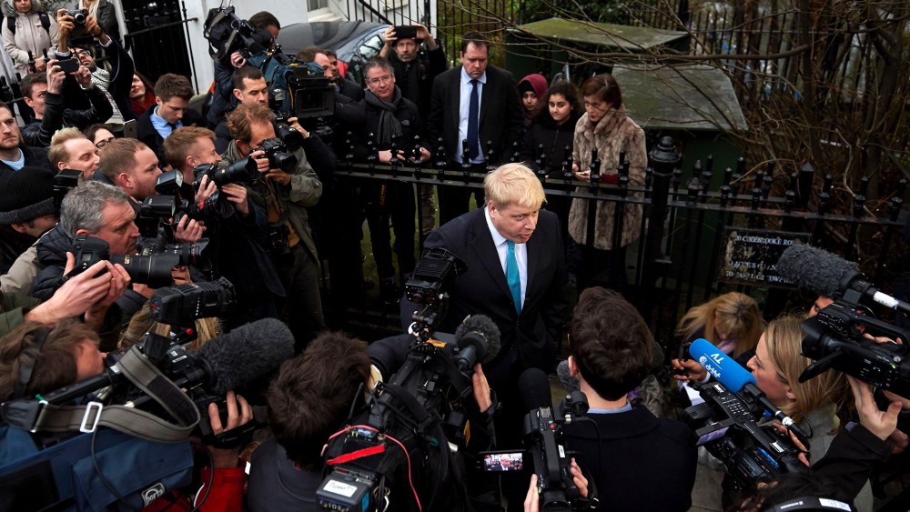 London Mayor Boris Johnson (C) delivers a statement to the media regarding his position on the forthcoming EU referendum outside his home in London on Feb. 21, 2016. (Photo by Niklas Halle'n/AFP/Getty)