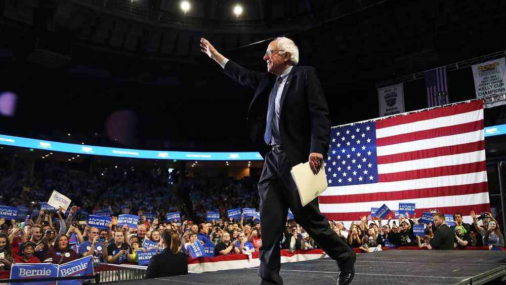 Democratic presidential candidate Sen. Bernie Sanders (D-VT) waves as he is introduced during a Future to Believe rally at the Bon Secours Wellness Arena on Feb. 21, 2016 in Greenville, S.C. (Photo by Joe Raedle/Getty)