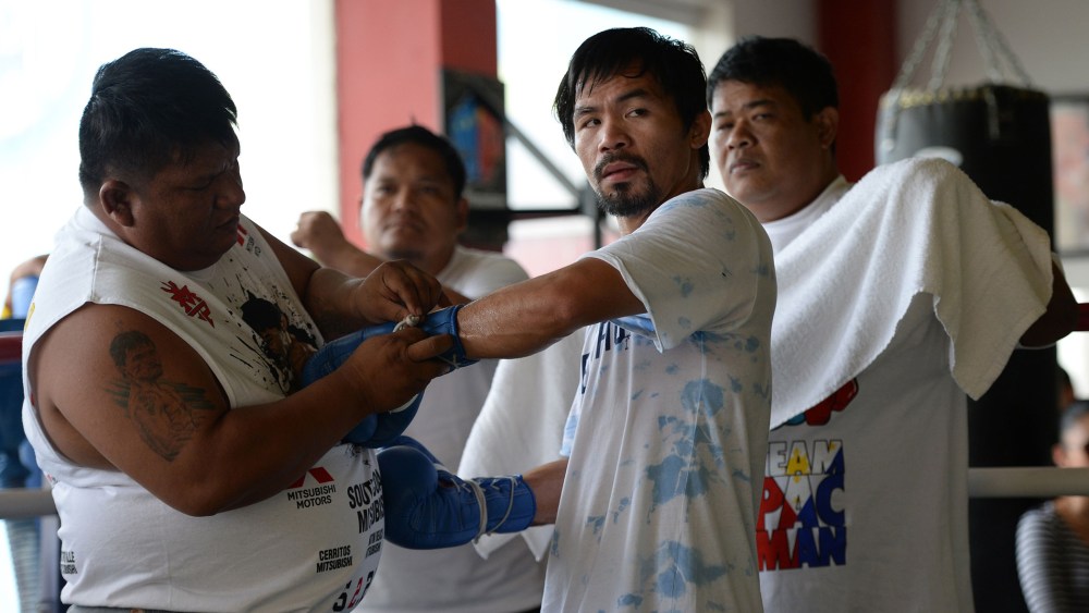 )Philippine boxing legend Manny Pacquiao prepares for a training session with his staff at a gym in General Santos City in the southern Philippine island of Mindanao., Feb. 15, 2016. (Photo by Ted Aljibe/AFP/Getty)