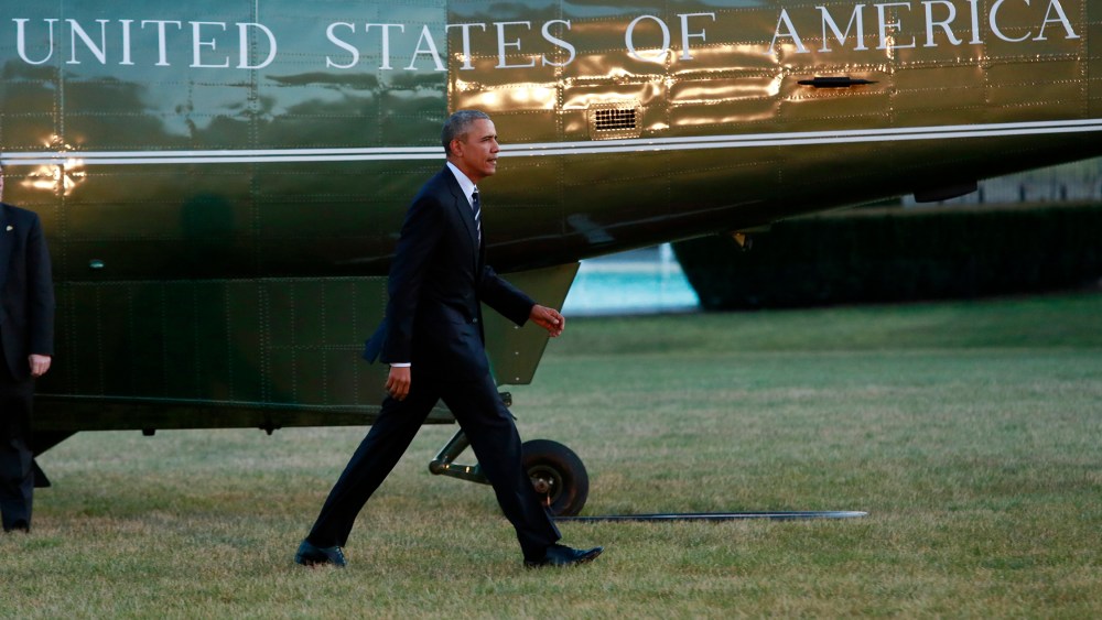 U.S. President Barack Obama walks on the South Lawn of the White House in Washington after a one day trip to Jacksonville, Fl., Feb. 26, 2016. (Photo by Yuri Gripas/AFP/Getty)
