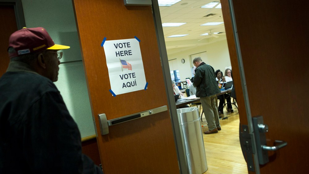 Voters prepare to cast their ballots in the presidential primary at the Herndon Community Center in Herndon, Va., on Super Tuesday, March 1, 2016. (Photo by Allison Shelley/For The Washington Post/Getty)