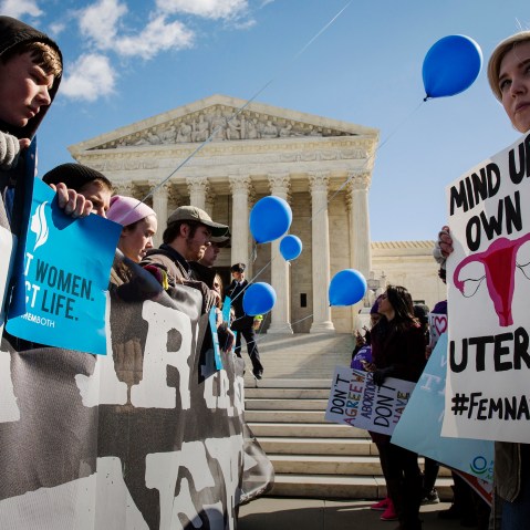 Pro-choice advocates and anti-abortion advocates rally outside of the Supreme Court, March 2, 2016 in Washington, DC. (Photo by Drew Angerer/Getty)