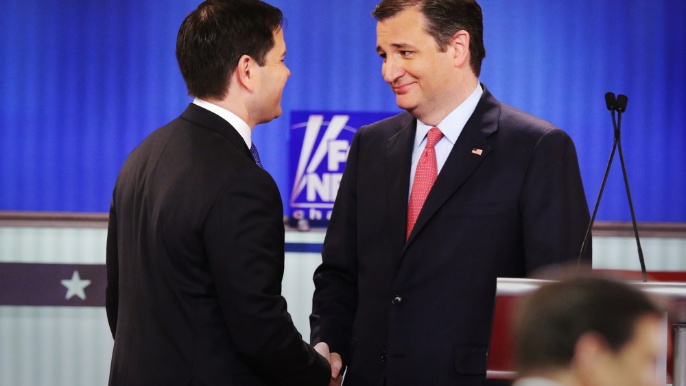 Republican presidential candidates Sen. Marco Rubio (R-FL) and Sen. Ted Cruz (R-TX) shake hands in a debate at the Fox Theatre on March 3, 2016 in Detroit, Mich. (Photo by Chip Somodevilla/Getty)