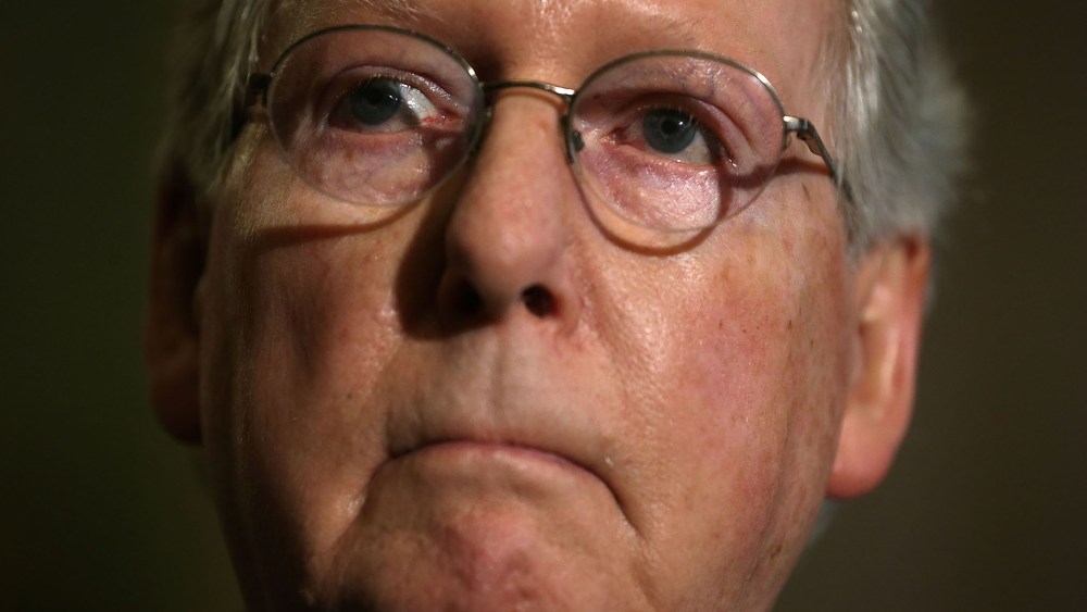 U.S. Senate Majority Leader Sen. Mitch McConnell listens during a news briefing after the weekly Republican policy luncheon, March 8, 2016 on Capitol Hill in Washington, DC. (Photo by Alex Wong/Getty)