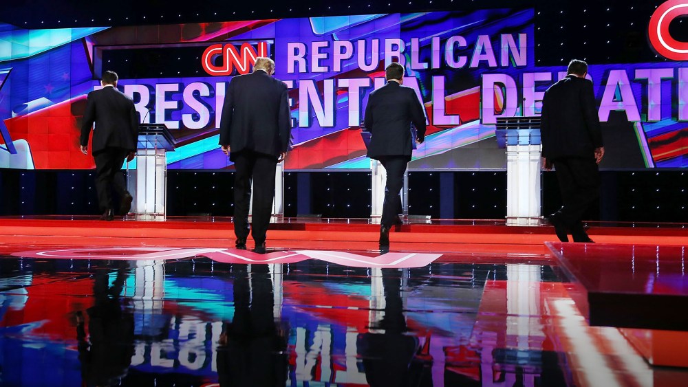 Republican presidential candidates walk to their podiums at the start of the Republican Presidential Primary Debate on the campus of the University of Miami on March 10, 2016 in Coral Gables, Fla. (Photo by Joe Raedle/Getty)