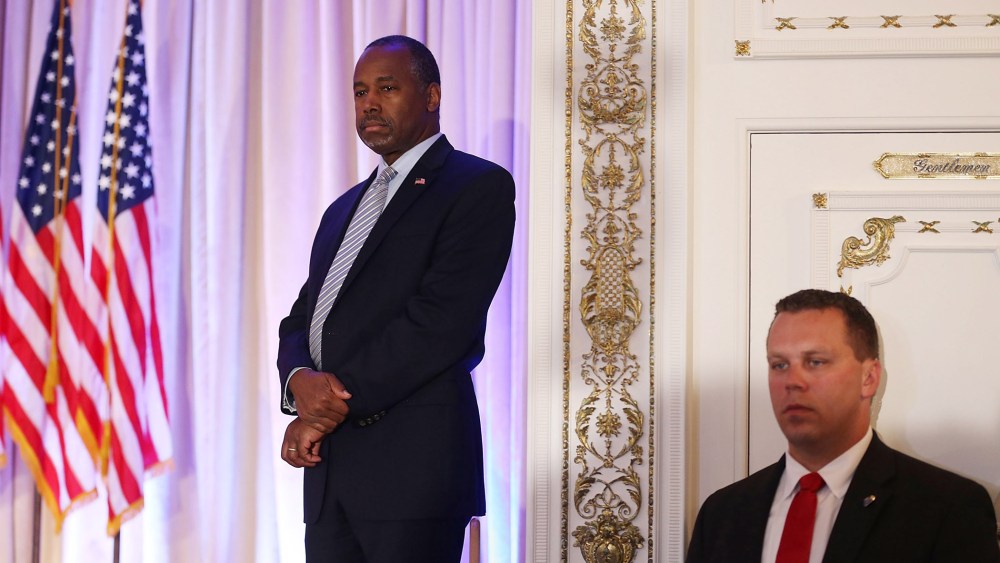 Former Republican presidential candidate Ben Carson gives his endorsement to Republican presidential candidate Donald Trump during a press conference at the Mar-A-Lago Club on March 11, 2016 in Palm Beach, Fl. (Photo by Joe Raedle/Getty)