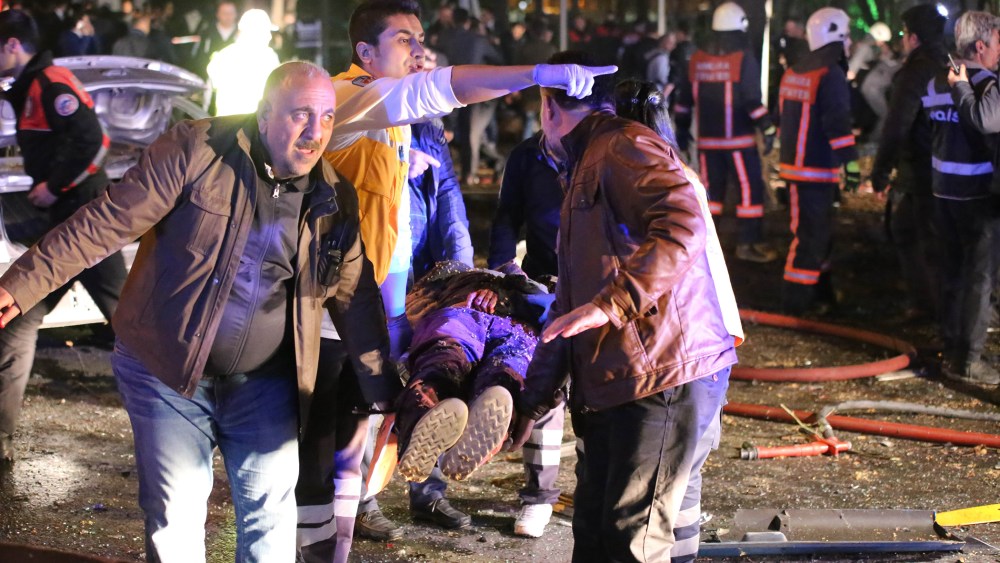 Rescuers carry a victim on a stretcher at the scene of a blast in Ankara on March 13, 2016. At least 27 people were killed and 75 others wounded in a blast in the heart of the Turkish capital Ankara. (Photo by Erol Ucem/AFP/Getty)
