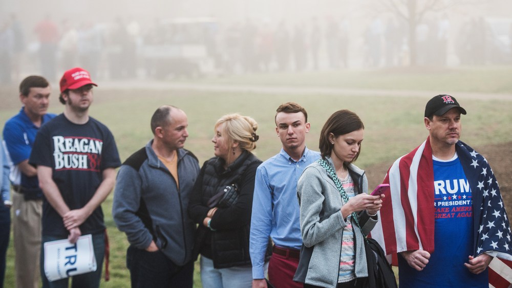 Donald Trump supporters wait in line before a campaign rally for the Republican presidential candidate at Lenoir-Rhyne University March 14, 2016 in Hickory, N.C. (Photo by Sean Rayford/Getty)