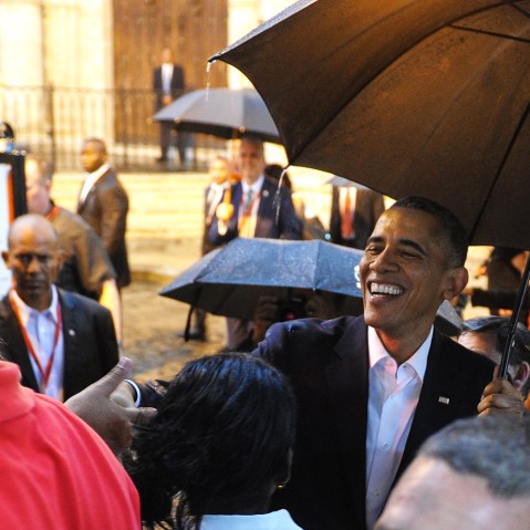 President Obama talks to tourists and Cubans at his arrival to the Havana Cathedral, on March 20, 2016. (Photo by Yamil Lage/AFP/Getty)