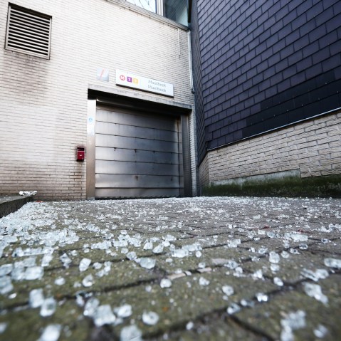 Broken glass is seen outside an entrance to Maelbeek metro station following todays attack on March 22, 2016 in Brussels, Belgium. (Photo by Carl Court/Getty)