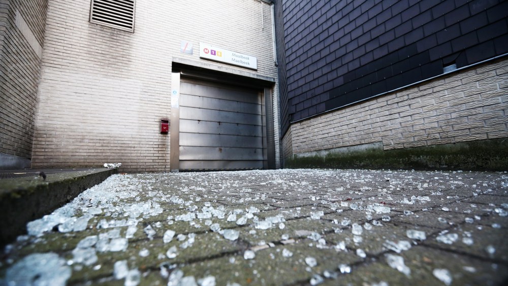 Broken glass is seen outside an entrance to Maelbeek metro station following todays attack on March 22, 2016 in Brussels, Belgium. (Photo by Carl Court/Getty)