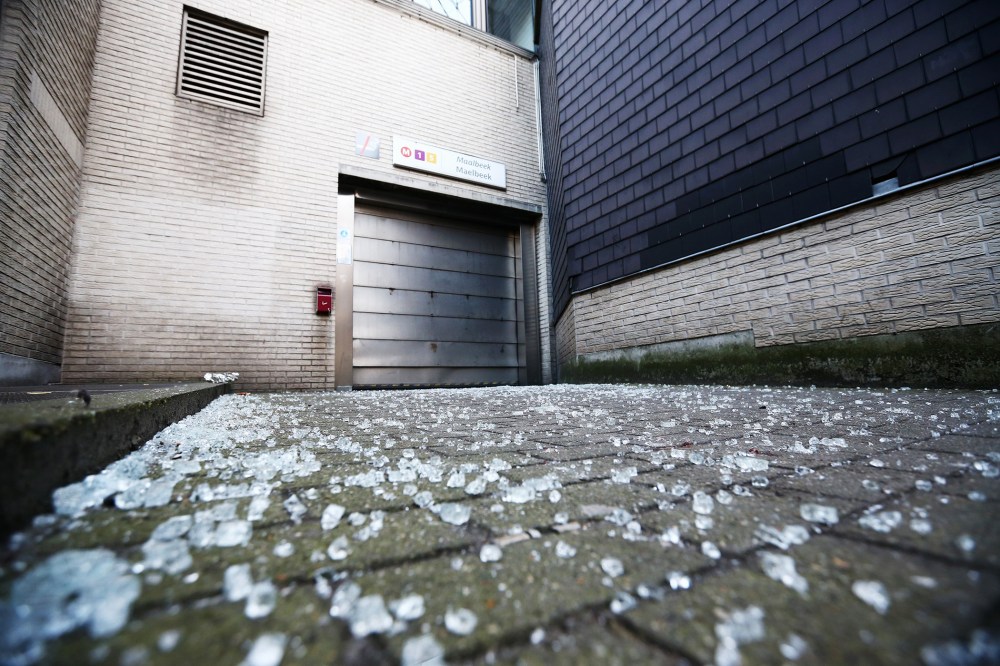 Broken glass is seen outside an entrance to Maelbeek metro station following todays attack on March 22, 2016 in Brussels, Belgium. (Photo by Carl Court/Getty)