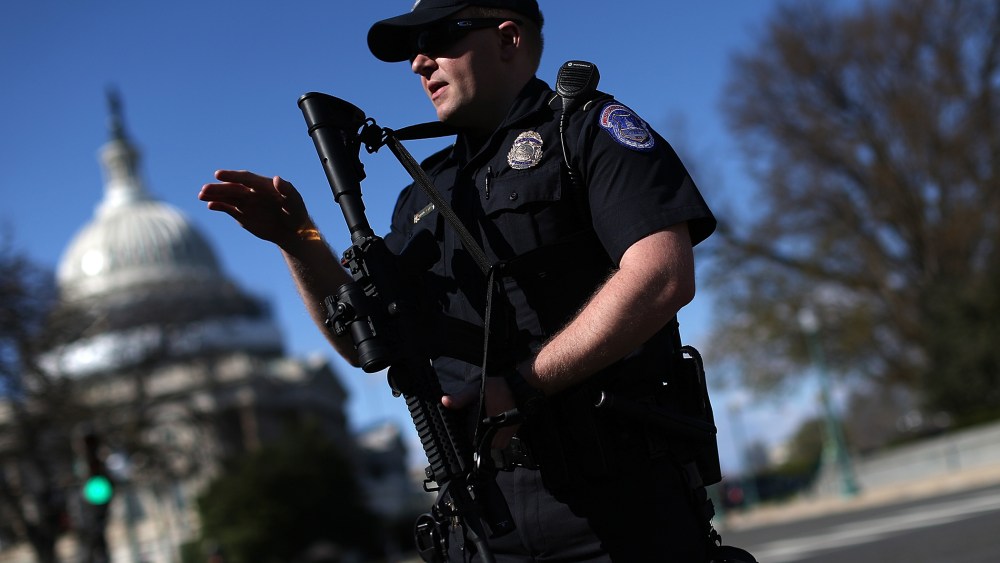 Heavily armed Capitol police stand guard after at least one person was shot in the Capitol Visitor Center March 28, 2016 in Washington, DC. (Photo by Win McNamee/Getty)