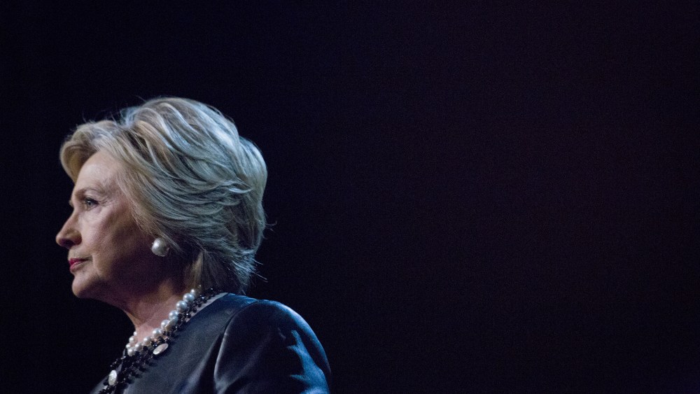 Hillary Clinton pauses while speaking during a campaign event at the Apollo Theater in New York, March 30, 2016. (Photo by John Taggart/Bloomberg/Getty)