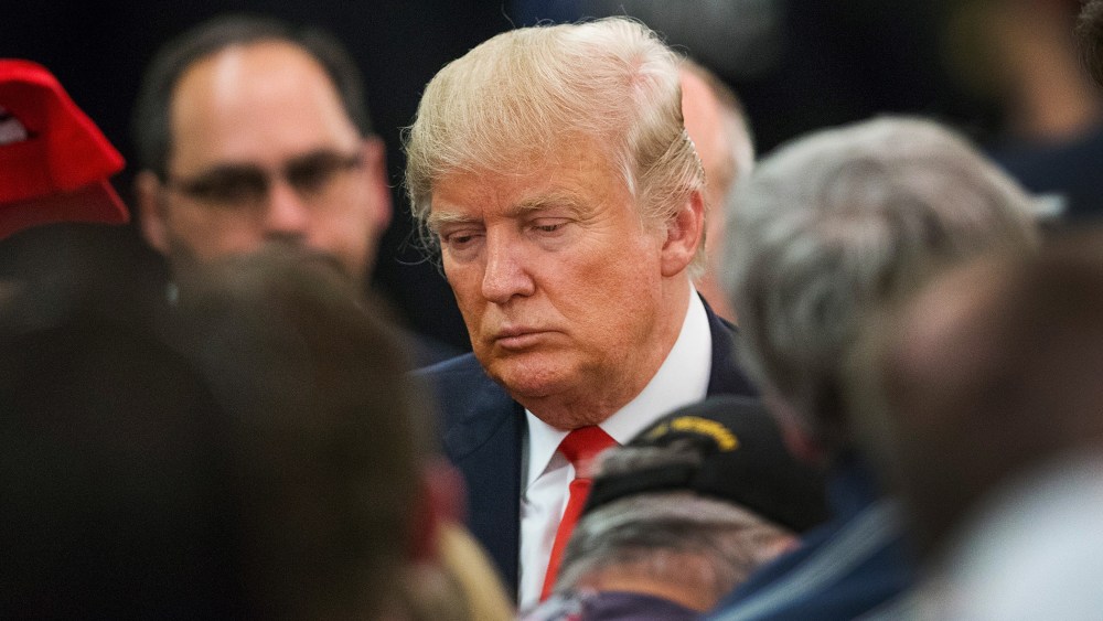 Republican presidential candidate Donald Trump greets guests following a campaign rally at the Radisson Paper Valley Hotel on March 30, 2016 in Appleton, Wis. (Photo by Scott Olson/Getty)