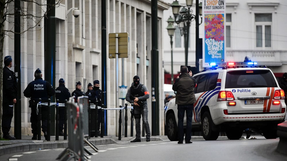 Police block the street outside the council chamber in Brussels, where two terrorism cases will behind closed doors, on March 31, 2016. (Photo by John Thys/AFP/Getty)