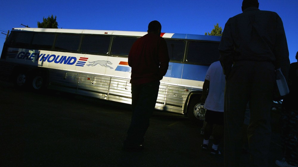 Passengers line up to board a Greyhound bus. (Photo by Spencer Platt/Fortune Magazine/Getty)